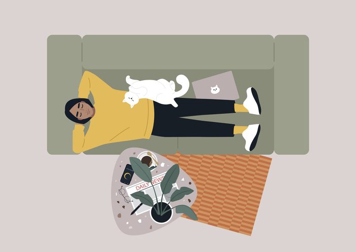 5 ways to create a kickass SaaS product engagement strategy 3 Serene Afternoon Nap on a Cozy Sofa With a Feline Friend for article on SaaS product engagement strategies