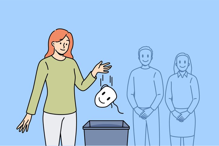 Authentic UX leadership: Why embracing imperfection builds stronger teams 6 Woman takes care of own personality and throws mask that hides mood and emotions into bucket. Concept of importance of person personality and finding true self, which allows one to achieve sincerity