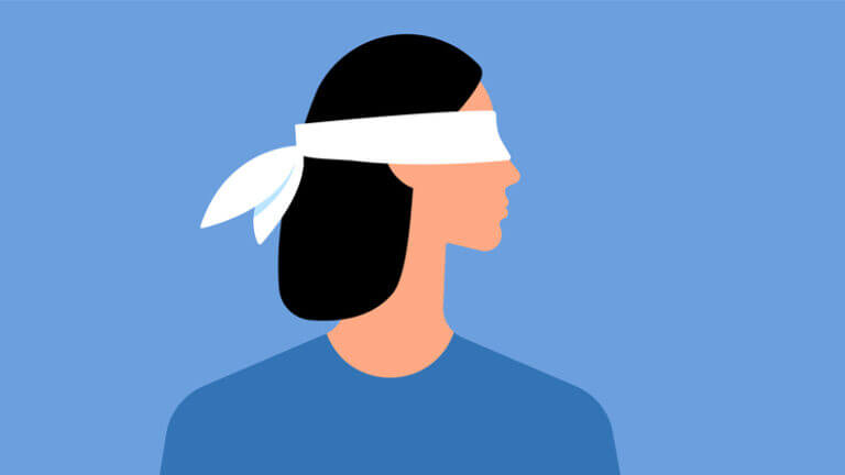 The hidden UX of team engagement in product design: Why leaders should pay attention 12 Silhouette of a blindfolded woman