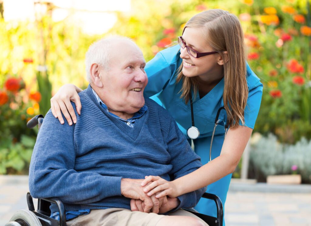 7 ways to transform your healthcare website redesign 5 older man in wheelchair with nurse hugging him