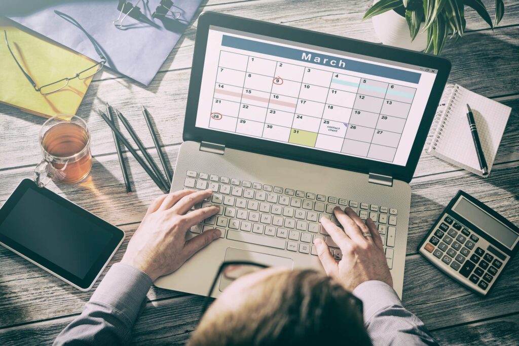top view of person working over a laptop