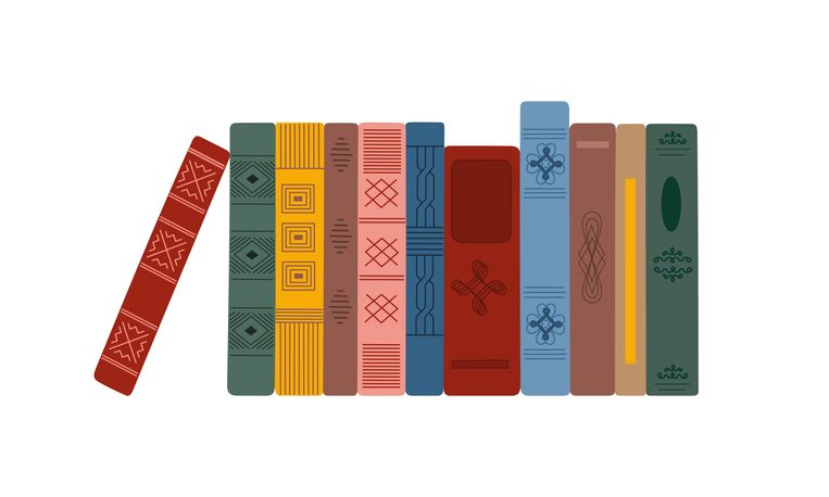 Collection of vertical standing books in colored vintage covers. 