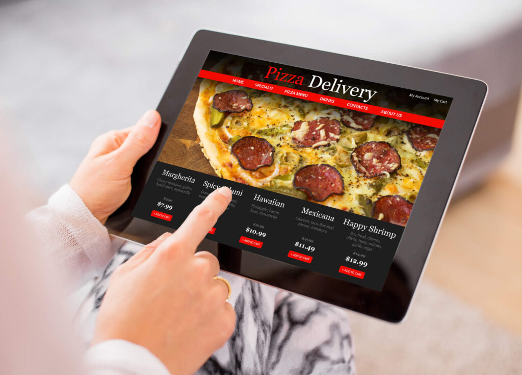 Woman ordering pizza online